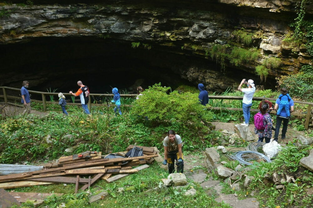 Cleaning up trash at Hidden River Cave